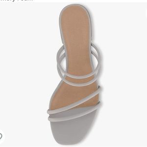 Low block heel sandal. Pale gray